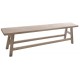 Trestle style large bench made from solid wood with a stripped back wood finish